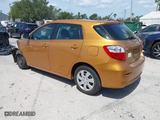 2009 Toyota Matrix S with VIN 2T1LE40E49C001740, listed as a IAAI auction lot 42088899 with 173,939 mi miles. Bid and sale history available at carsss.com. Image 3.