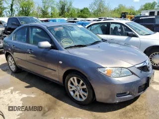 2007 Mazda 3 i Touring with VIN JM1BK12F771613103, listed as a Copart auction lot 52523994 with 259,387 mi miles and Salvage Title. Bid and sale history available at DreamBid. Image 4.
