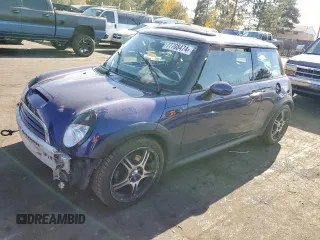 2005 MINI Hardtop S with VIN WMWRE33495TD96038, listed as a Copart auction lot 77708474 with 82,159 mi miles and Salvage Title. Bid and sale history available at DreamBid. Image 1.