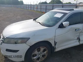 2010 Honda Crosstour EX-L z VIN 5J6TF1H51AL001055, wystawiony jako IAAI lot #42272313 z przebiegiem 228 485 mil mil oraz . Historia ofert i sprzedaży dostępna na DreamBid. Obrazek 6.