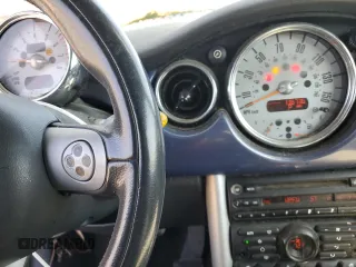 2006 MINI Convertible with VIN WMWRF33556TG14421, listed as a Copart auction lot 50090415 with 136,736 mi miles and Non repairable. Bid and sale history available at DreamBid. Image 9.