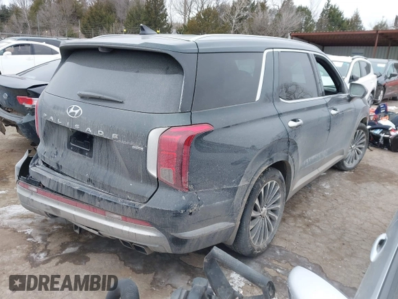 2023 Hyundai Palisade Calligraphy z VIN KM8R7DGE0PU640381, wystawiony jako IAAI lot #41601559 z przebiegiem 20 418 mil mil oraz . Historia ofert i sprzedaży dostępna na DreamBid. Obrazek 4.