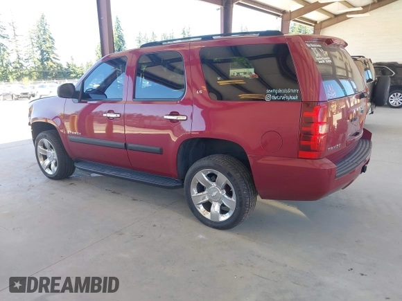 2007 Chevrolet Tahoe LS with VIN 1GNFC13C07R256584, listed as a IAAI auction lot 42678748 with 214,040 mi miles and . Bid and sale history available at DreamBid. Image 3.