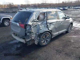 2020 Mitsubishi Outlander ES z VIN JA4AZ3A32LZ040935, wystawiony jako IAAI lot #41521469 z przebiegiem 86 106 mil mil oraz . Historia ofert i sprzedaży dostępna na DreamBid. Obrazek 4.