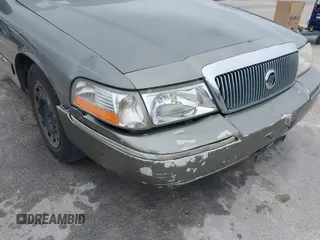2003 Mercury Grand Marquis GS Convenience z VIN 2MEFM74W83X678151, wystawiony jako IAAI lot #42393410 z przebiegiem 273 966 mil mil oraz . Historia ofert i sprzedaży dostępna na DreamBid. Obrazek 14.