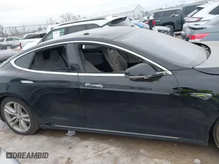 2015 Tesla Model S 85D with VIN 5YJSA1E25FF107819, listed as a IAAI auction lot 41333556 with 141,066 mi miles. Bid and sale history available at carsss.com. Image 13.