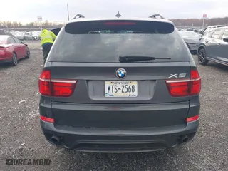 2011 BMW X5 35i with VIN 5UXZV4C59BL415034, listed as a IAAI auction lot 40969149 with 108,468 mi miles. Bid and sale history available at carsss.com. Image 16.
