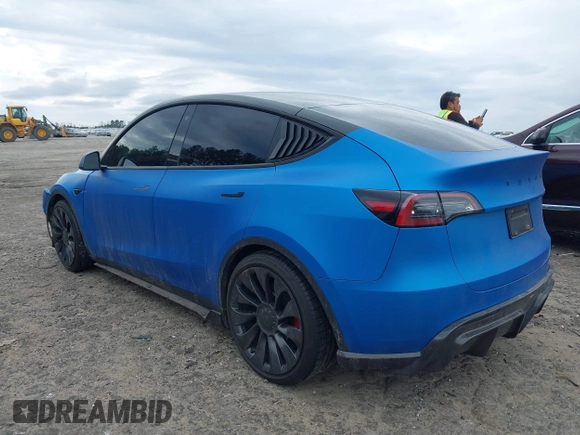 2021 Tesla Model Y Performance z VIN 5YJYGDEF8MF209819, wystawiony jako IAAI lot #41757009 z przebiegiem 37 685 mil mil oraz . Historia ofert i sprzedaży dostępna na DreamBid. Obrazek 3.