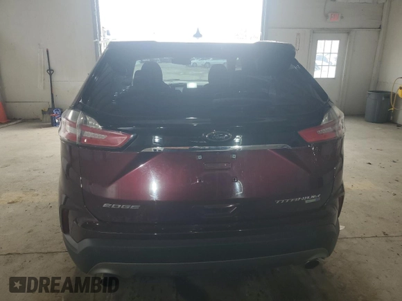 2019 Ford Edge Titanium z VIN 2FMPK4K94KBC11873, wystawiony jako Copart lot #58737735 z przebiegiem 127 278 mil mil oraz Czysty tytuł • Clean title. Historia ofert i sprzedaży dostępna na DreamBid. Obrazek 6.