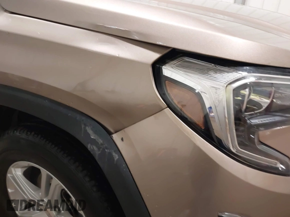 2018 GMC Terrain SLE z VIN 3GKALTEV8JL386984, wystawiony jako IAAI lot #41815320 z przebiegiem 67 230 mil mil oraz . Historia ofert i sprzedaży dostępna na DreamBid. Obrazek 18.