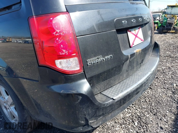 2013 Dodge Grand Caravan SXT with VIN 2C4RDGCG1DR626827, listed as a IAAI auction lot 38984754 with 224,487 mi miles and . Bid and sale history available at DreamBid. Image 6.