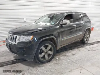 2011 Jeep Grand Cherokee Overland Summit with VIN 1J4RR6GT5BC702214, listed as a IAAI auction lot 41368605 with 183,068 mi miles. Bid and sale history available at carsss.com. Image 18.