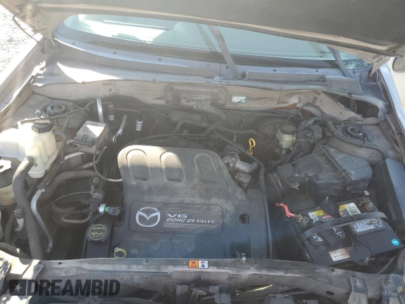 2001 Mazda Tribute LX with VIN 4F2CU08151KM28828, listed as a Copart auction lot 47933495 with 241,901 mi miles and Non Repairable. Bid and sale history available at carsss.com. Image 12.