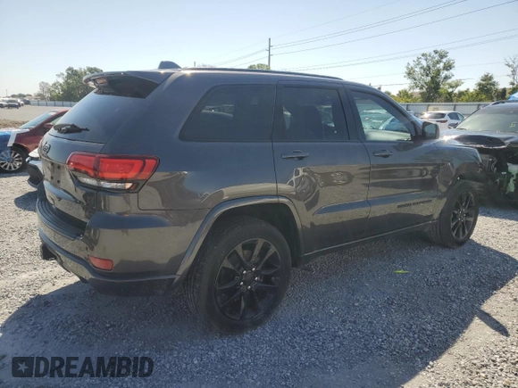 2017 Jeep Grand Cherokee 75th Anniversary with VIN 1C4RJEAG4HC700191, listed as a Copart auction lot 52520655 with 130,828 mi miles and Salvage title. Bid and sale history available at DreamBid. Image 3.