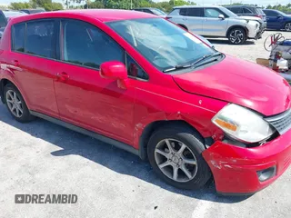 2009 Nissan Versa S with VIN 3N1BC13E69L500633, listed as a IAAI auction lot 42137113 with 193,491 mi miles and . Bid and sale history available at carsss.com. Image 6.