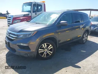 2017 Honda Pilot EX-L with VIN 5FNYF6H59HB032480, listed as a IAAI auction lot 42488789 with 112,595 mi miles and . Bid and sale history available at DreamBid. Image 17.