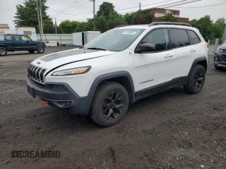 2015 Jeep Cherokee Trailhawk with VIN 1C4PJMBS6FW680963, listed as a Copart auction lot 61306385 with 174,793 mi miles and Clean title. Bid and sale history available at DreamBid. Image 1.