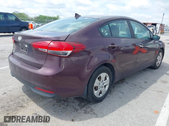 2018 Kia Forte LX with VIN 3KPFK4A70JE165286, listed as a IAAI auction lot 42128779 with 124,348 mi miles. Bid and sale history available at carsss.com. Image 4.
