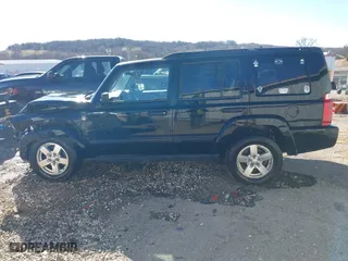 2006 Jeep Commander with VIN 1J8HG48N66C174256, listed as a IAAI auction lot 41652107 with 106,966 mi miles. Bid and sale history available at carsss.com. Image 15.