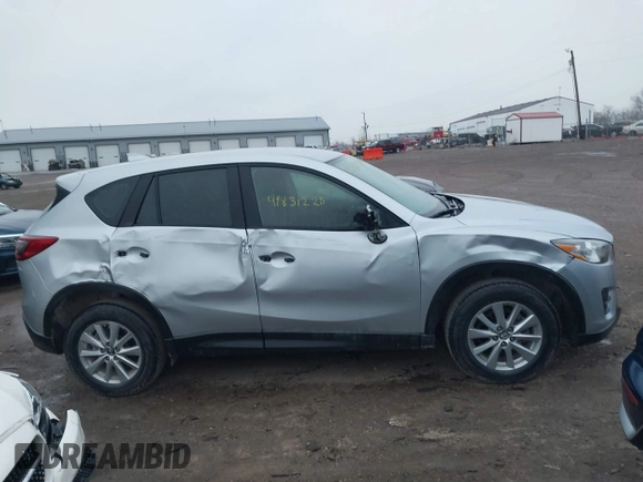 2016 Mazda CX-5 Sport with VIN JM3KE2BY5G0647715, listed as a IAAI auction lot 41831228 with 89,689 mi miles and . Bid and sale history available at DreamBid. Image 13.