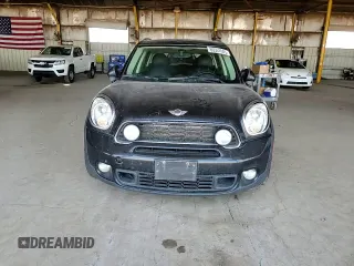 2011 MINI Countryman S with VIN WMWZC5C54BWM10218, listed as a Copart auction lot 60557685 with 192,422 mi miles and Salvage title. Bid and sale history available at DreamBid. Image 13.