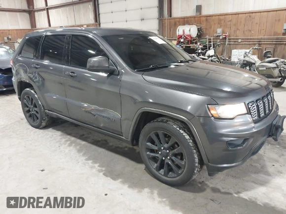 2017 Jeep Grand Cherokee Laredo with VIN 1C4RJFAG8HC910038, listed as a IAAI auction lot 41928179 with 76,862 mi miles. Bid and sale history available at carsss.com. Image 1.
