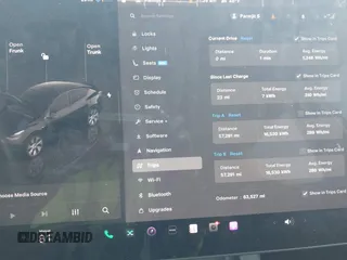 2023 Tesla Model Y Long Range z VIN 7SAYGAEE5PF603128, wystawiony jako IAAI lot #41328797 z przebiegiem 63 527 mil mil oraz . Historia ofert i sprzedaży dostępna na DreamBid. Obrazek 7.