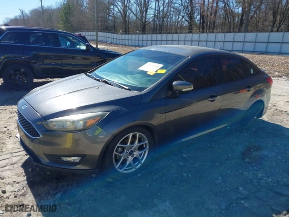 2015 Ford Focus SE with VIN 1FADP3F22FL264972, listed as a IAAI auction lot 41674698 with 117,376 mi miles. Bid and sale history available at carsss.com. Image 2.