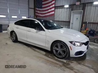 2016 BMW 4 Series 428i xDrive with VIN WBA4C9C55GG137762, listed as a Copart auction lot 46083245 with 100,591 mi miles and Salvage Title. Bid and sale history available at DreamBid. Image 4.