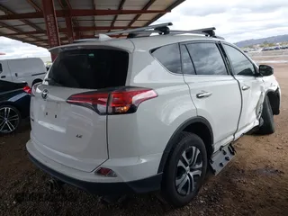 2017 Toyota RAV4 LE with VIN JTMZFREV5HJ707504, listed as a IAAI auction lot 41802321 with 63,834 mi miles and . Bid and sale history available at carsss.com. Image 4.