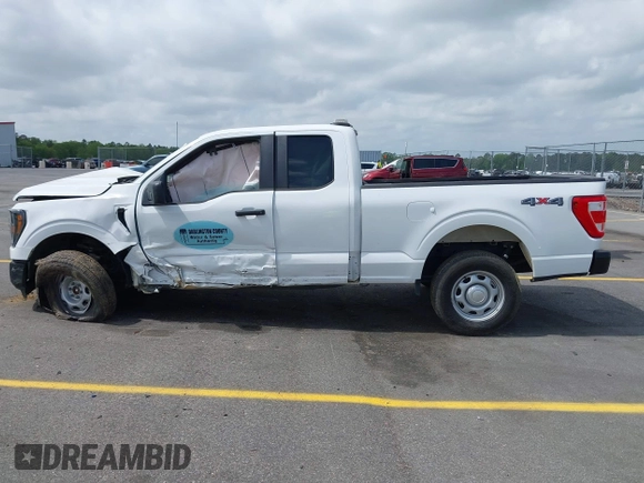 2023 Ford F-150 XL with VIN 1FTFX1E85PKF31252, listed as a IAAI auction lot 41948661 with 18,076 mi miles and . Bid and sale history available at DreamBid. Image 14.