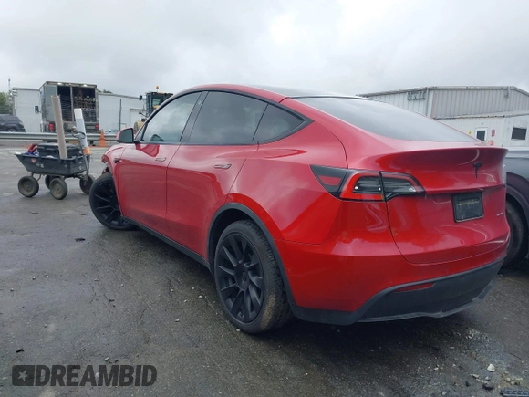 2021 Tesla Model Y Long Range with VIN 5YJYGDEE5MF085032, listed as a IAAI auction lot 41982925 with 64,541 mi miles and . Bid and sale history available at DreamBid. Image 3.