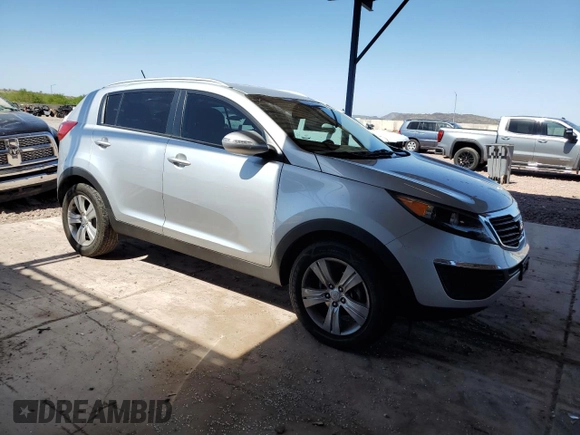 2011 Kia Sportage LX with VIN KNDPB3A2XB7087961, listed as a Copart auction lot 64266405 with 97,094 mi miles and Salvage title. Bid and sale history available at DreamBid. Image 4.