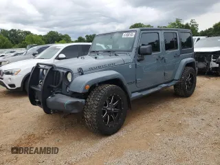 2014 Jeep Wrangler Unlimited Rubicon X with VIN 1C4BJWFG8EL245700, listed as a Copart auction lot 61080105 with 154,217 mi miles and Salvage title. Bid and sale history available at DreamBid. Image 1.