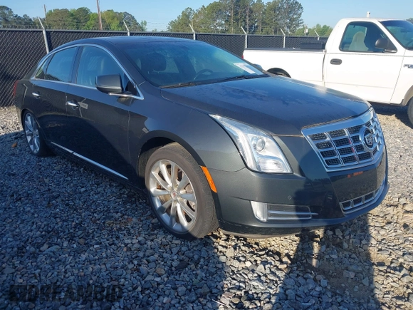 2013 Cadillac XTS Luxury with VIN 2G61P5S3XD9141306, listed as a IAAI auction lot 42034077 with 120,294 mi miles. Bid and sale history available at carsss.com. Image 1.