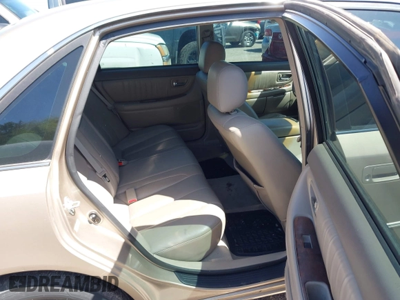 2002 Toyota Avalon XL with VIN 4T1BF28B62U261312, listed as a IAAI auction lot 41957062 with 233,443 mi miles. Bid and sale history available at carsss.com. Image 8.