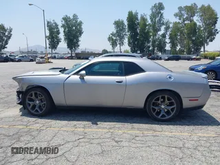 2015 Dodge Challenger SXT Plus z VIN 2C3CDZBG0FH715823, wystawiony jako IAAI lot #42354845 z przebiegiem 130 879 mil mil oraz . Historia ofert i sprzedaży dostępna na DreamBid. Obrazek 15.