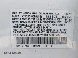 2012 Honda Pilot EX-L with VIN 5FNYF4H56CB021904, listed as a IAAI auction lot 41798179 with 190,617 mi miles and . Bid and sale history available at DreamBid. Image 9.