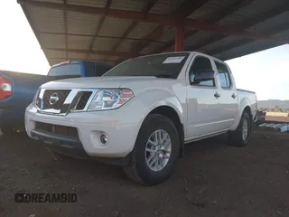 2021 Nissan Frontier SV z VIN 1N6ED0EA3MN710382, wystawiony jako IAAI lot #42083600 z przebiegiem 43 022 mil mil oraz . Historia ofert i sprzedaży dostępna na DreamBid. Obrazek 2.