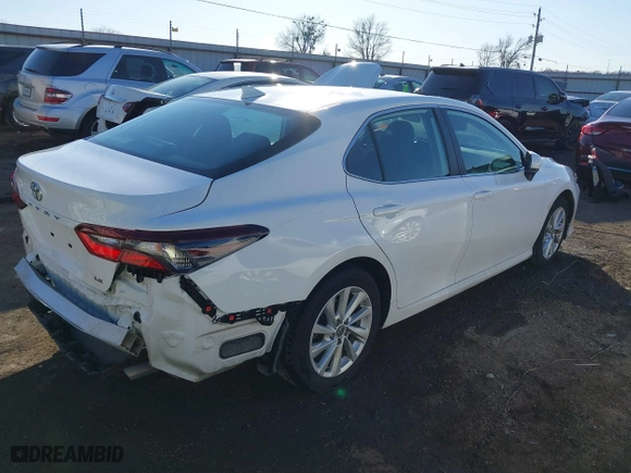 2023 Toyota Camry LE with VIN 4T1C11AK6PU181720, listed as a IAAI auction lot 41423643 with 42,610 mi miles. Bid and sale history available at carsss.com. Image 4.