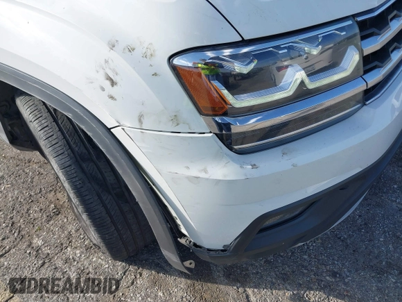 2019 Volkswagen Atlas SE z VIN 1V2WR2CA8KC504134, wystawiony jako IAAI lot #41700050 z przebiegiem 97 047 mil mil oraz . Historia ofert i sprzedaży dostępna na DreamBid. Obrazek 19.