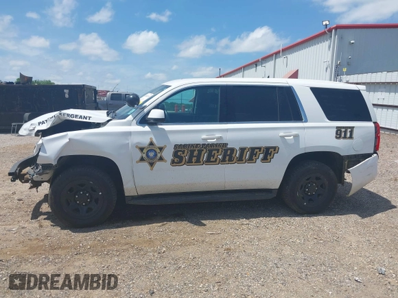2020 Chevrolet Tahoe Commercial with VIN 1GNLCDECXLR154849, listed as a IAAI auction lot 42050778 with 124,771 mi miles and . Bid and sale history available at DreamBid. Image 15.