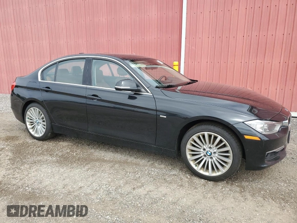 2012 BMW 3 Series 328i with VIN WBA3A5C57CF345040, listed as a Copart auction lot 63761735 with 106,665 mi miles and Clean title. Bid and sale history available at DreamBid. Image 4.