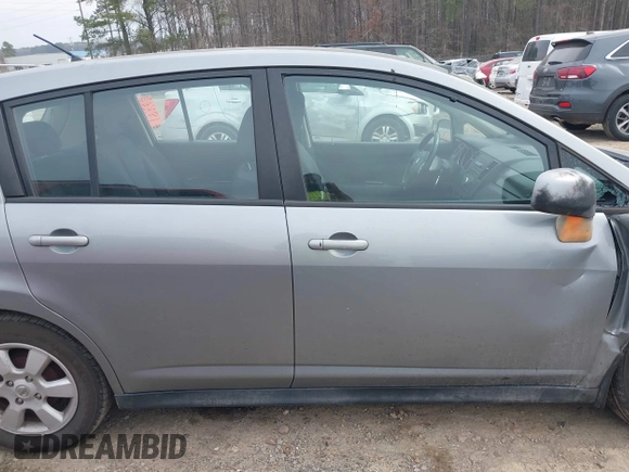 2009 Nissan Versa S with VIN 3N1BC13E59L407294, listed as a IAAI auction lot 41692951 with 250,029 mi miles and . Bid and sale history available at DreamBid. Image 13.