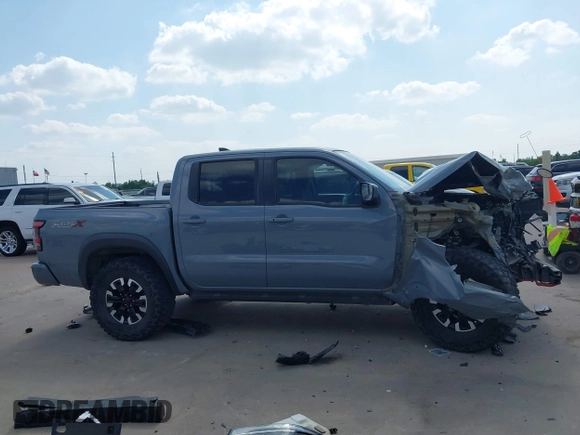 2022 Nissan Frontier SV z VIN 1N6ED1EJ3NN661336, wystawiony jako IAAI lot #42331182 z przebiegiem Nie podano mil oraz . Historia ofert i sprzedaży dostępna na DreamBid. Obrazek 14.