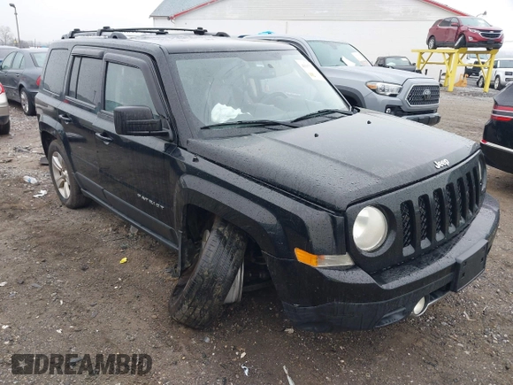 2014 Jeep Patriot Limited with VIN 1C4NJRCBXED503572, listed as a IAAI auction lot 41937793 with 112,015 mi miles. Bid and sale history available at carsss.com. Image 1.