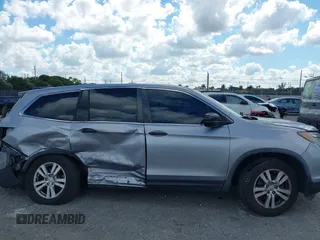 2016 Honda Pilot LX with VIN 5FNYF6H1XGB099987, listed as a IAAI auction lot 41556979 with 98,373 mi miles. Bid and sale history available at carsss.com. Image 13.