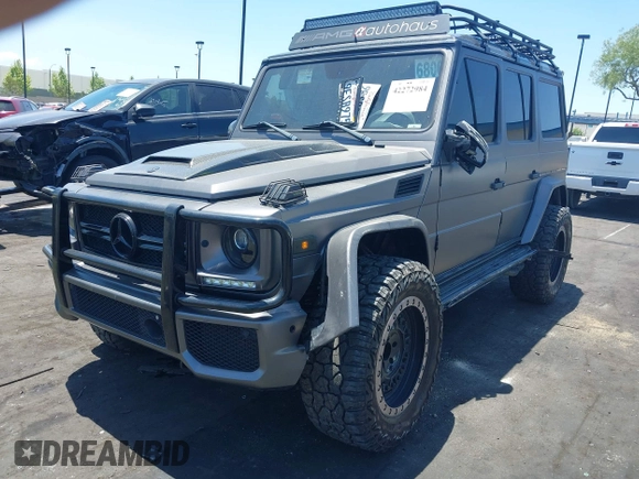2014 Mercedes-Benz G 63 AMG with VIN WDCYC7DF7EX220956, listed as a IAAI auction lot 42272984 with 129,893 mi miles and . Bid and sale history available at DreamBid. Image 21.