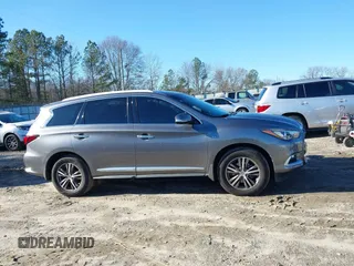 2016 Infiniti QX60 with VIN 5N1AL0MM0GC524715, listed as a IAAI auction lot 41215072 with 145,633 mi miles and . Bid and sale history available at DreamBid. Image 13.