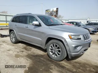 2014 Jeep Grand Cherokee Overland with VIN 1C4RJFCG4EC326325, listed as a Copart auction lot 49166645 with 128,261 mi miles and Salvage Title. Bid and sale history available at DreamBid. Image 4.